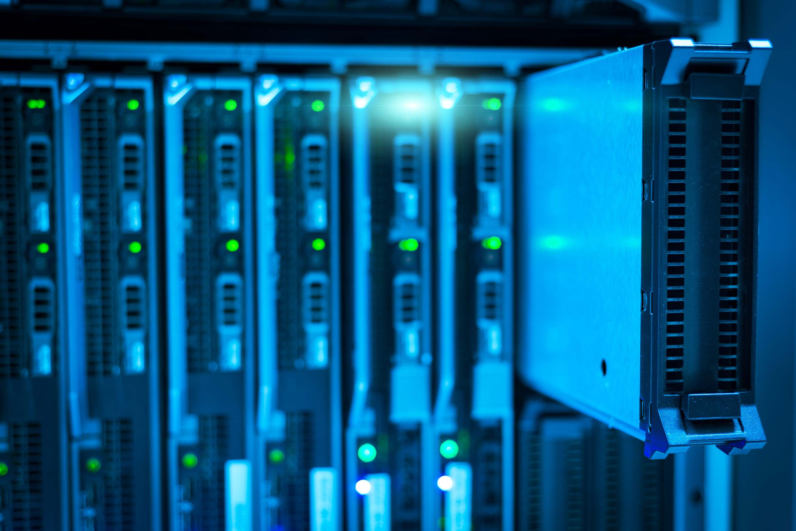 Computer storage hardware arranged on a surface with server rack detail